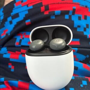 GooglePixel Earbuds Headphones with White Case.